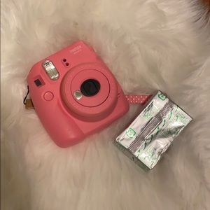 Pink Polaroid instax mini 9 with one refill pack